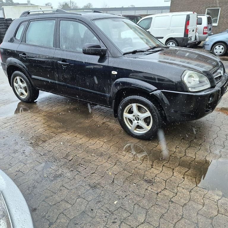 Gebraucht Hyundai Tucson 141 PS (103 kW) 2009 Schwarz SUV