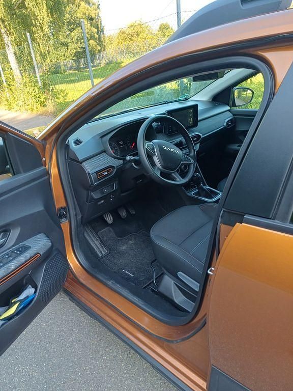 Gebraucht Dacia Sandero Expression 101 PS (74 kW) 2023 Orange Limousine