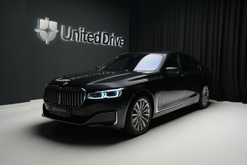Grau Gebraucht 2022 BMW 740 Limousine | 65.900 € (Teuer) - Bild 1/4