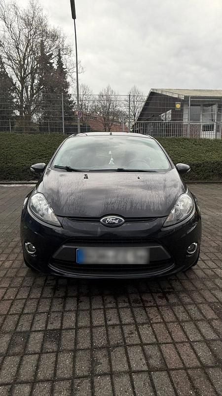 Schwarz Gebraucht 2012 Ford Fiesta Champions Edition Limousine | 4.199 € (Fairer Preis) - Bild 1/4