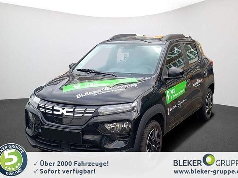 Magmaschwarz (metallic) Gebraucht 2023 Dacia Spring Essentiel Kleinwagen | 14.290 € (Etwas zu teuer) - Bild 1/4