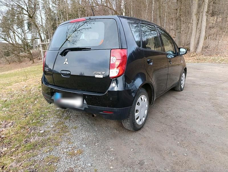 Gebraucht Mitsubishi Colt 95 PS (69 kW) 2011 Schwarz Kleinwagen