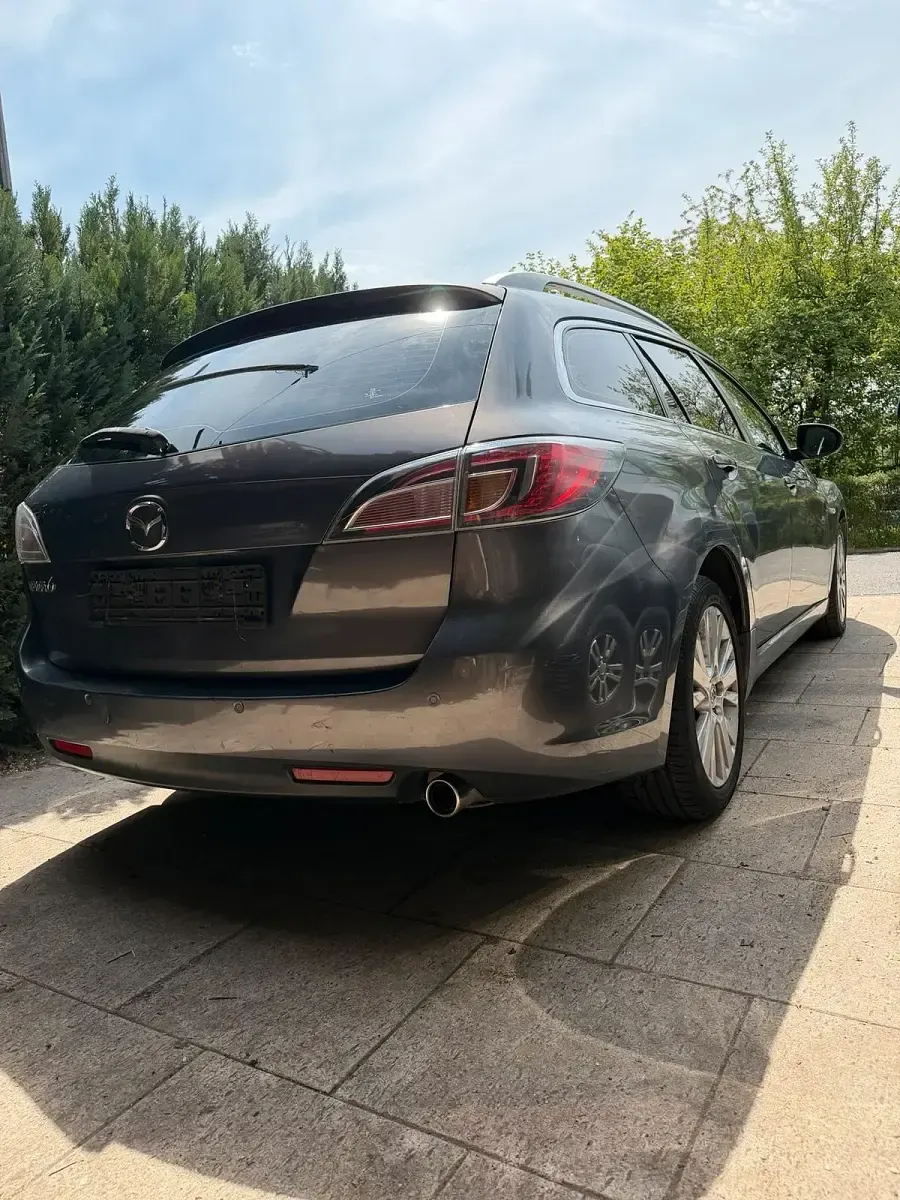Używany Mazda 6 140 KM (102 kW) 2010 Srebrny Kombi