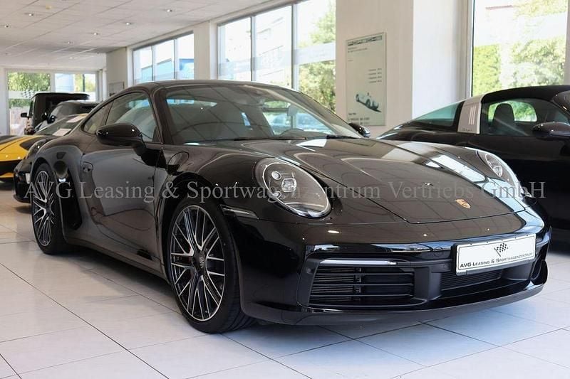 Glanzschwarz Gebraucht 2024 Porsche 911 Carrera S Coupé | 138.800 € (Fairer Preis) - Bild 1/4