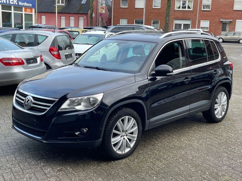 Deep black perleffekt Gebraucht 2011 VW Tiguan Team SUV | 7.999 € (Guter Preis) - Bild 1/4