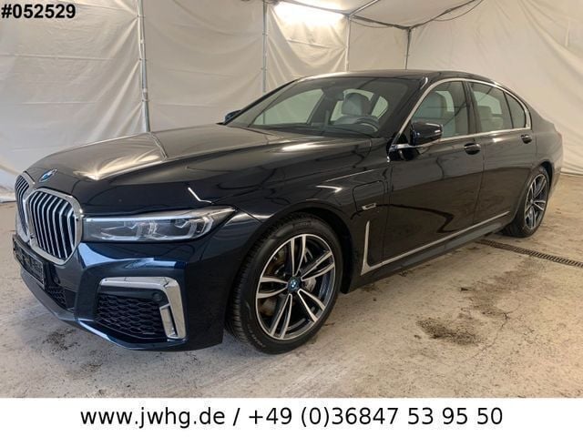 Carbonschwarz metallic Gebraucht 2021 BMW 745e M Sport Limousine | 51.990 € (Superpreis) - Bild 1/2