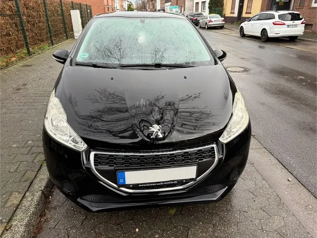Gebraucht Peugeot 208 Active 68 PS (50 kW) 2014 Schwarz Kleinwagen