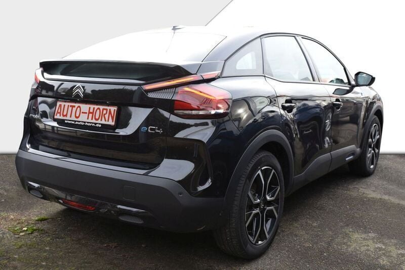 Gebraucht Citroën e-C4 Feel 100 kW (136 PS) 2023 Perla nera schwarz metallic Limousine