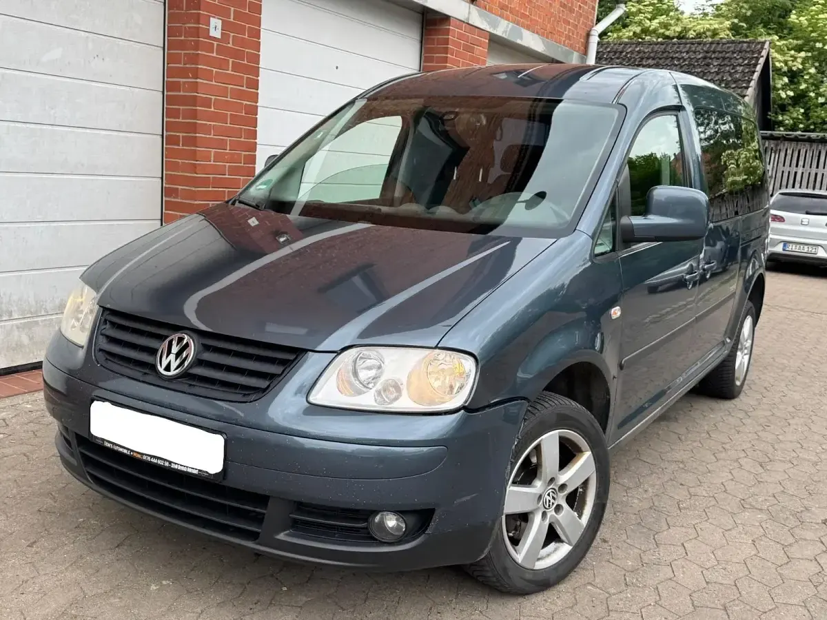 Gebraucht VW Caddy Team 105 PS (77 kW) 2010 Grau Van / Kleinbus
