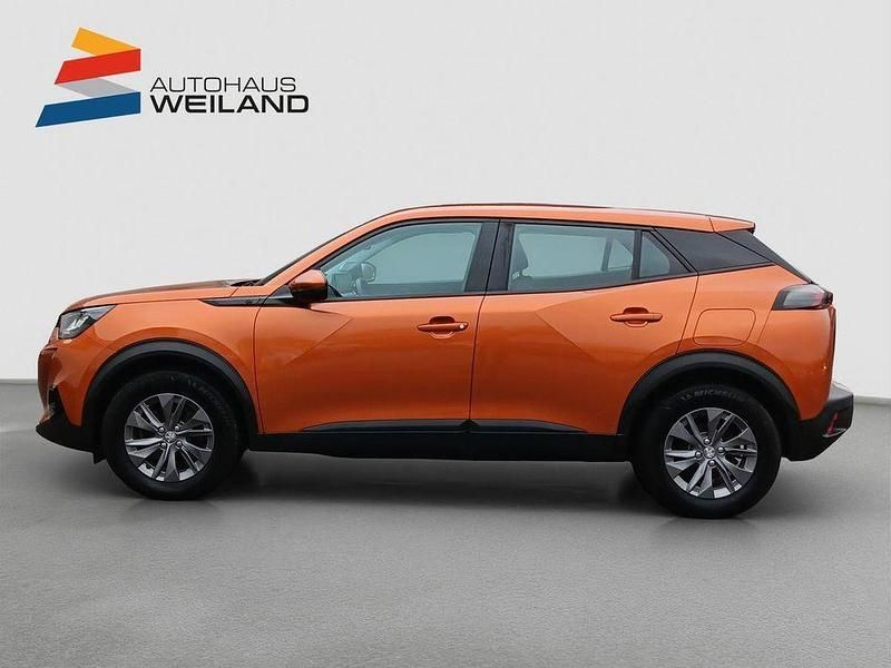 Second-hand Peugeot e-2008 Active 100 kW (136 CP) 2021 Portocaliu SUV