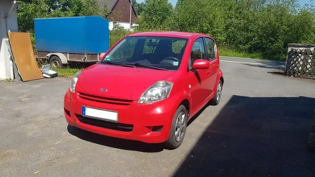 Gebraucht Daihatsu Sirion 69 PS (50 kW) 2009 Rot Kleinwagen