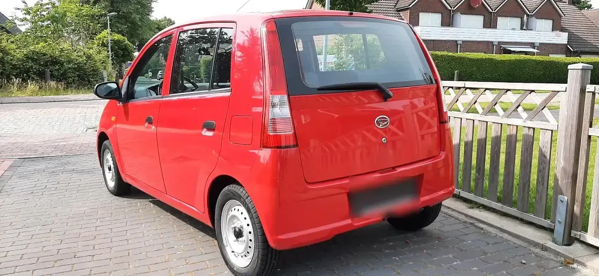 Gebraucht Daihatsu Cuore 59 PS (43 kW) 2006 Rot Kleinwagen