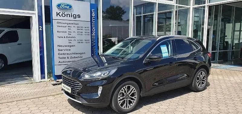 Obsidianschwarz metallic Gebraucht 2021 Ford Kuga Titanium SUV | 21.490 € (Fairer Preis) - Bild 1/4