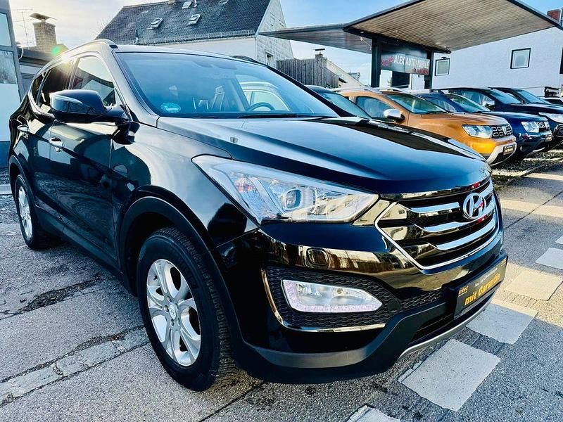 Schwarz Gebraucht 2012 Hyundai Santa Fe Premium SUV | 16.990 € - Bild 1/4