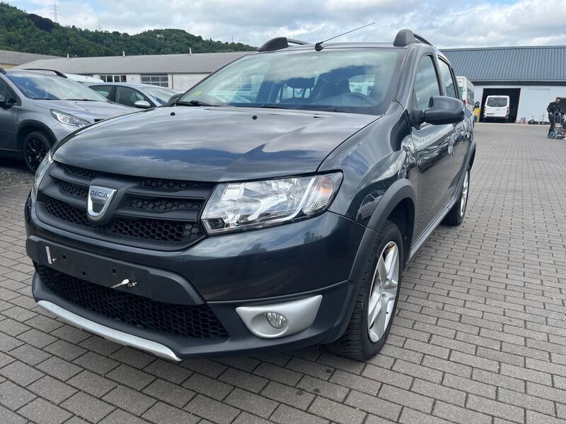 Grau Gebraucht 2016 Dacia Sandero Stepway Ambiance Kleinwagen | 4.200 € (Fairer Preis) - Bild 1/4