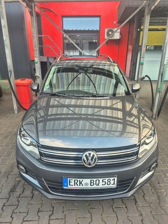 Grau Gebraucht 2014 VW Tiguan Exclusive SUV | 13.890 € (Fairer Preis) - Bild 1/4