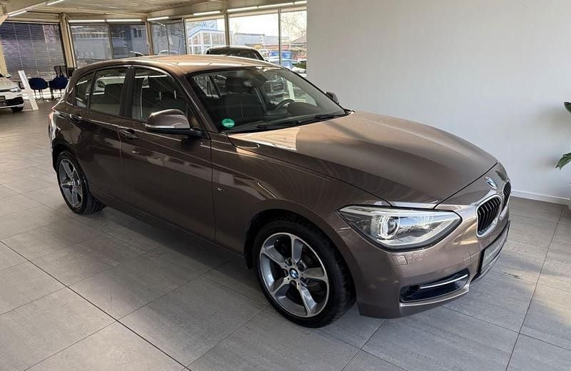 Gebraucht BMW 118 Sport Line 170 PS (125 kW) 2014 Sparkling bronze Kleinwagen