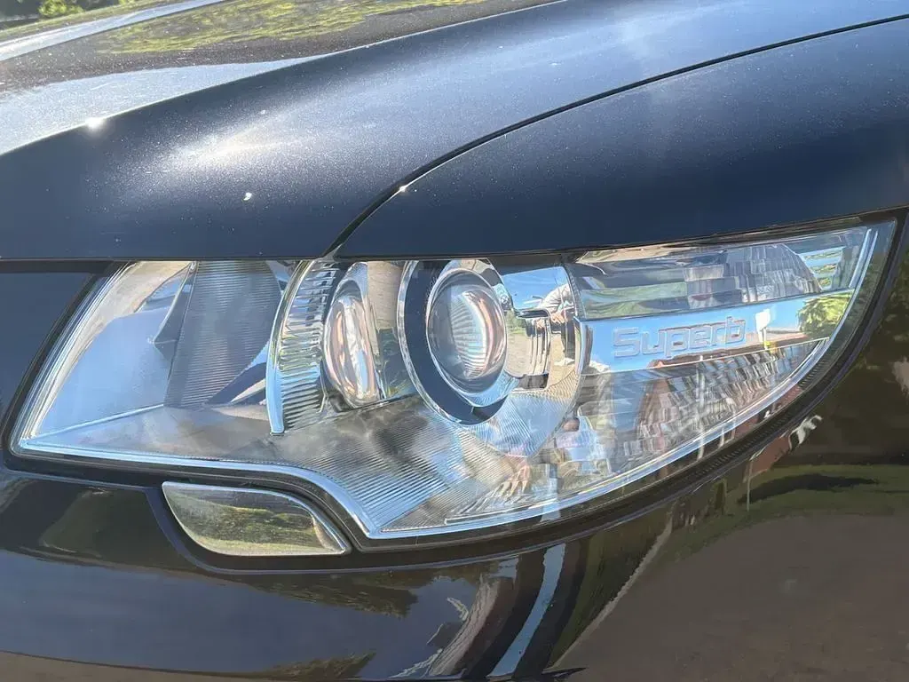 Używany Skoda Superb Elegance 170 KM (125 kW) 2012 Czarny Kombi