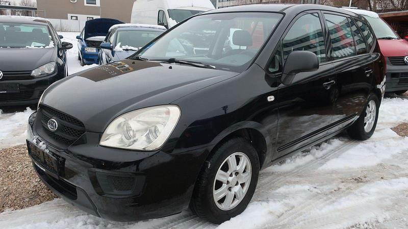 Schwarz Gebraucht 2009 Kia Carens Basis Van / Kleinbus | 1.890 € (Superpreis) - Bild 1/4