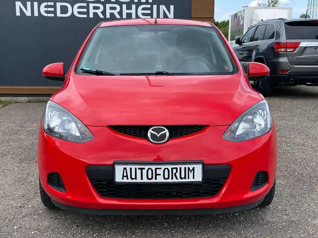 Używany Mazda 2 Inclusive 68 KM (50 kW) 2009 Czerwony Hatchback