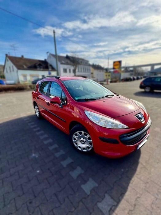 Gebraucht Peugeot 207 Tendance 73 PS (53 kW) 2009 Rot Kombi