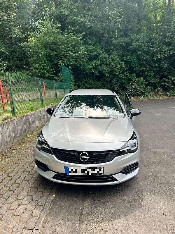 Grau Gebraucht 2021 Opel Astra Elegance Kombi | 14.900 € (Fairer Preis) - Bild 1/4
