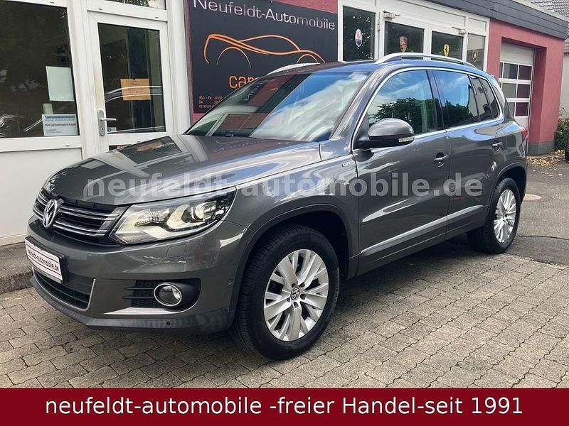 Grau Gebraucht 2013 VW Tiguan Life SUV | 10.800 € (Fairer Preis) - Bild 1/4