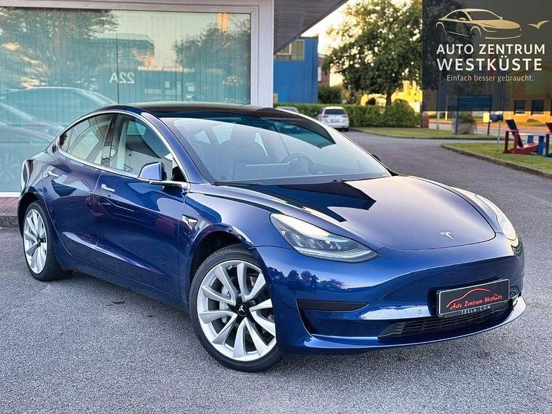 Blau Gebraucht 2019 Tesla Model 3 Standard Range Plus Limousine | 21.975 € (Fairer Preis) - Bild 1/4