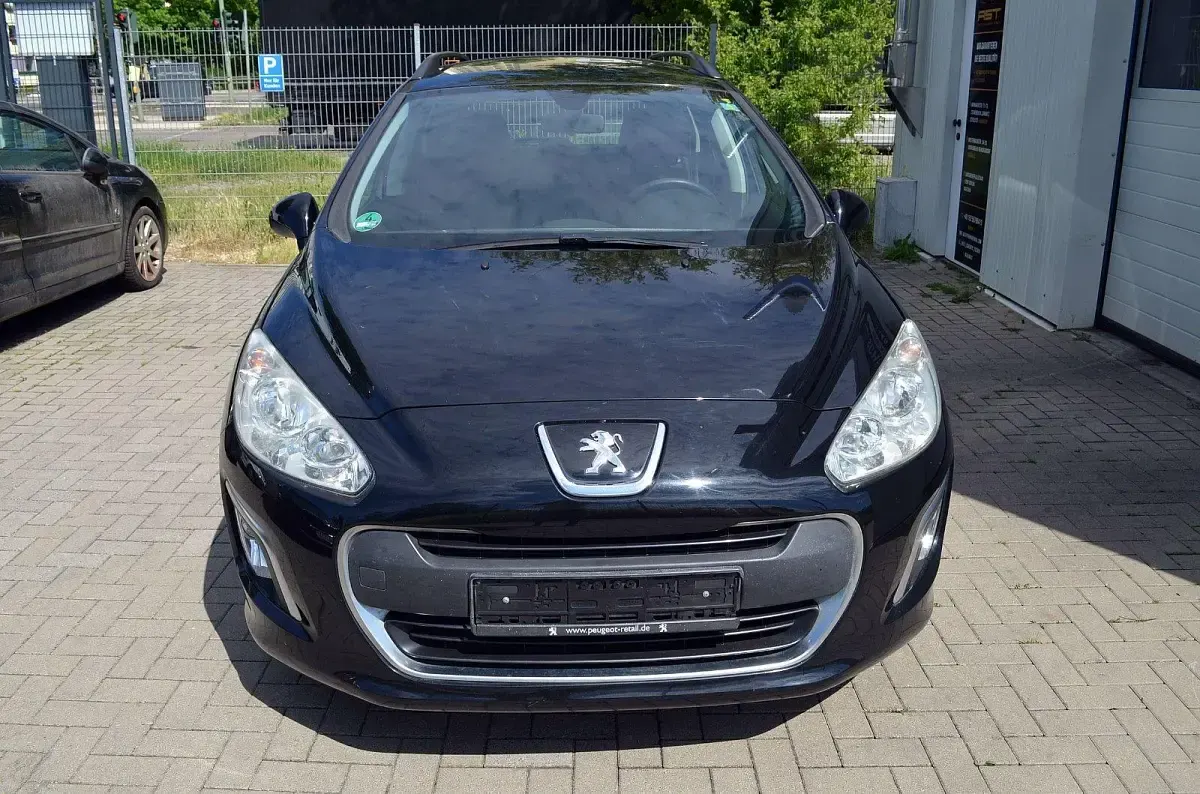 Gebraucht Peugeot 308 SW 92 PS (67 kW) 2011 Schwarz Kombi