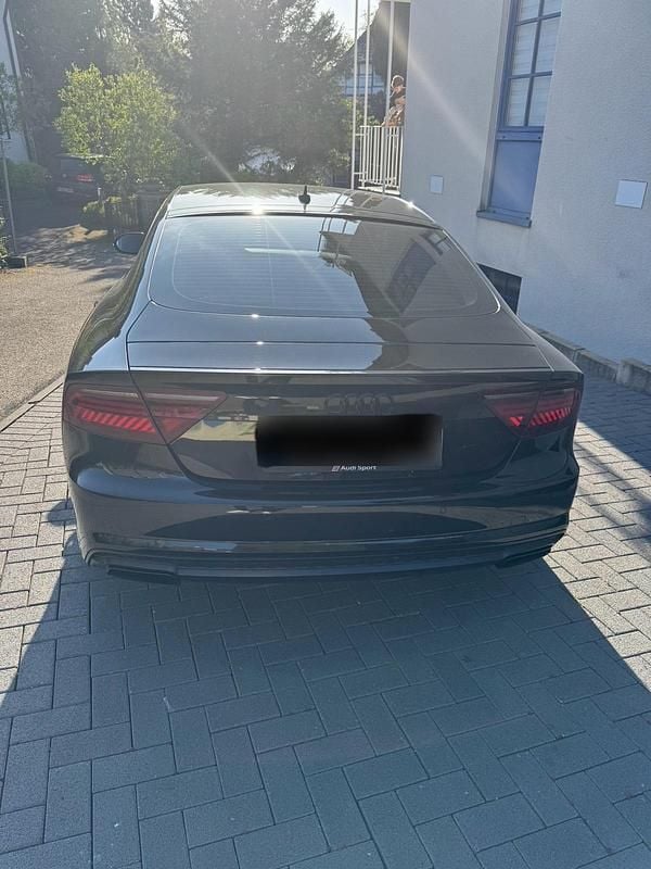 Second-hand Audi A7 Comfort 320 CP (235 kW) 2017 Negru Hatchback
