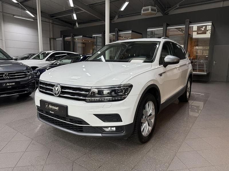 Pure white Gebraucht 2020 VW Tiguan Allspace Highline SUV | 26.490 € (Superpreis) - Bild 1/4