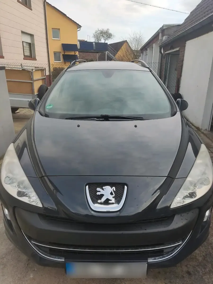Gebraucht Peugeot 308 95 PS (69 kW) 2009 Schwarz Kombi