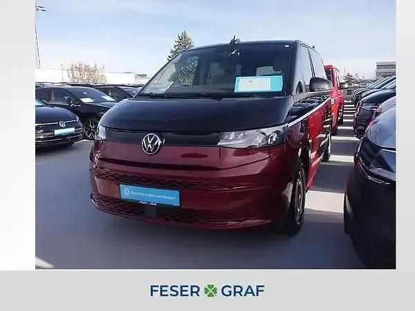 Deep black perleffekt/ fortanarot metallic Gebraucht 2022 VW Multivan Van | 38.880 € (Fairer Preis) - Bild 1/4