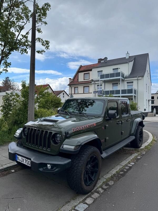 Grün Gebraucht 2021 Jeep Gladiator SUV | 53.200 € - Bild 1/4