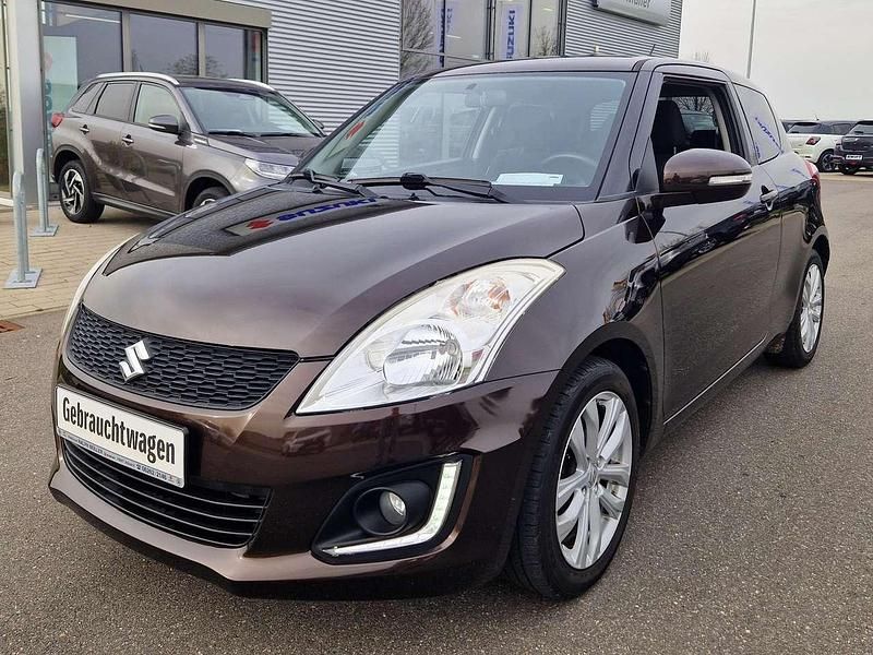 Braun Gebraucht 2015 Suzuki Swift Comfort Limousine | 8.400 € (Etwas zu teuer) - Bild 1/4