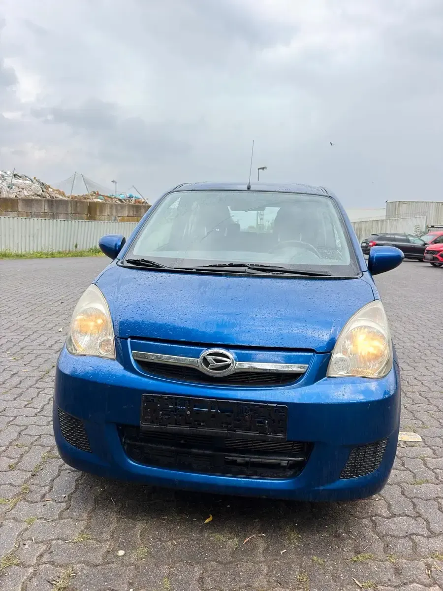 Gebraucht Daihatsu Cuore 69 PS (50 kW) 2009 Blau Kleinwagen