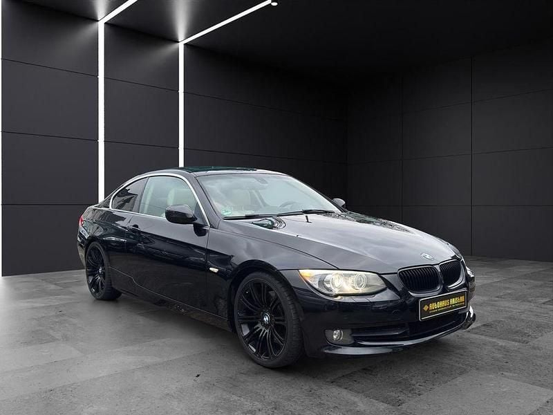 Schwarz Gebraucht 2011 BMW 335 Comfort Edition Coupé | 14.980 € (Fairer Preis) - Bild 1/4
