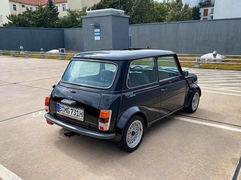 Second-hand Mini 1000 41 CP (30 kW) 1990 Negru Hatchback