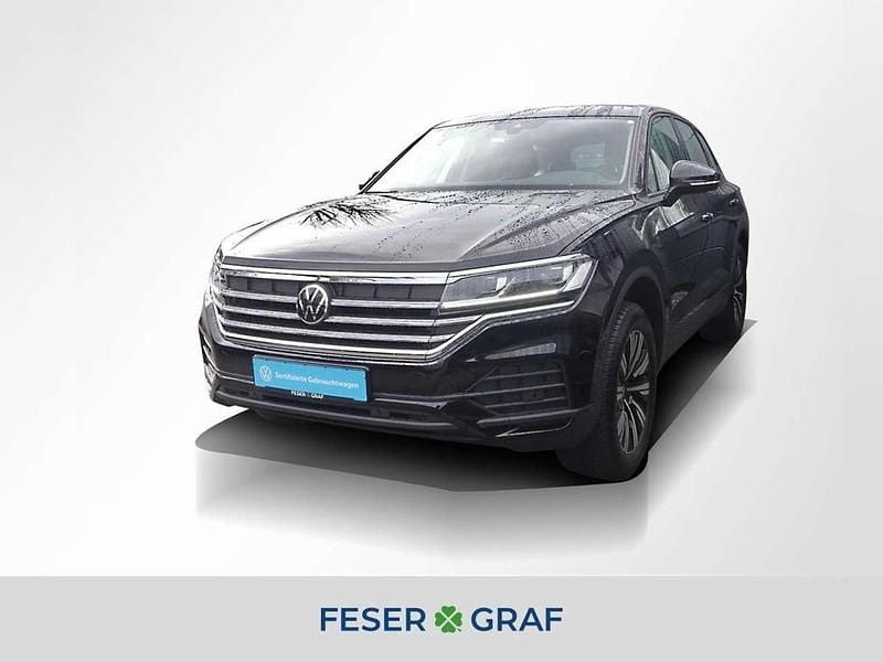 Grenadillschwarz metallic Gebraucht 2024 VW Touareg Basis SUV | 51.880 € (Guter Preis) - Bild 1/2