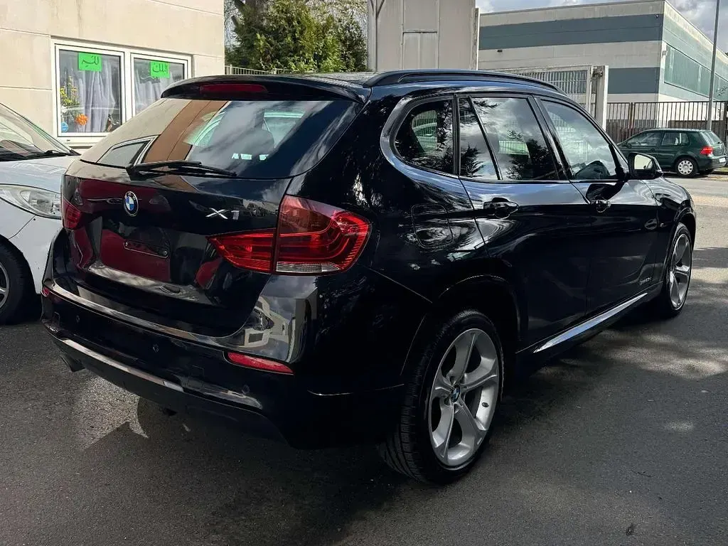 Gebraucht BMW X1 Performance 218 PS (160 kW) 2013 Black sapphire metallic SUV