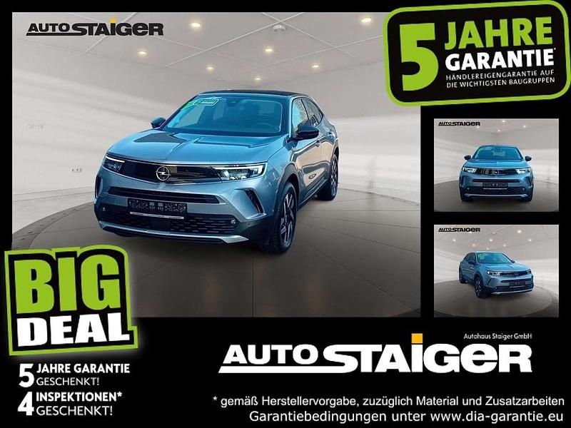 Gebraucht Opel Mokka Elegance 131 PS (96 kW) 2023 Kontrast grau/quarz silber SUV