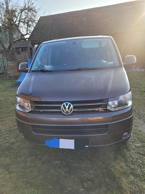 Braun Gebraucht 2010 VW Caravelle Comfortline Van / Kleinbus | 14.500 € (Fairer Preis) - Bild 1/4