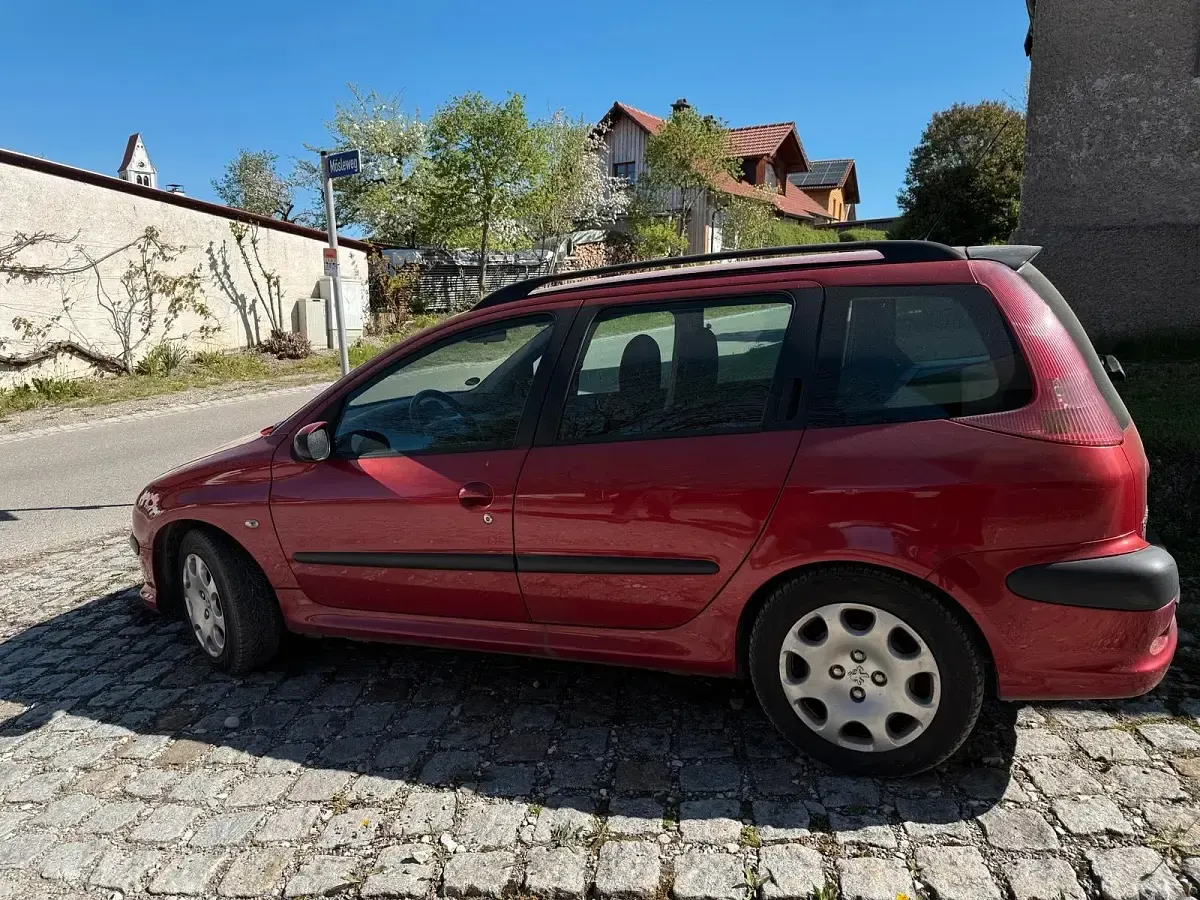Używany Peugeot 206 108 KM (79 kW) 2012 Czerwony Kombi