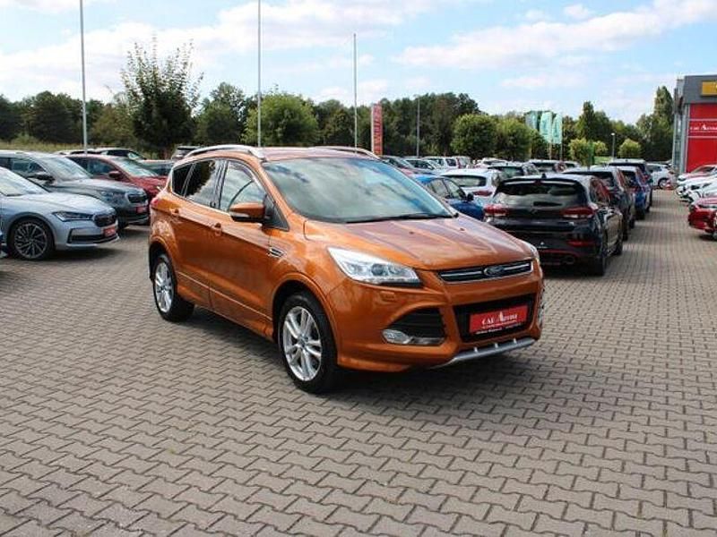 Orange Gebraucht 2016 Ford Kuga Individual SUV | 17.490 € - Bild 1/4