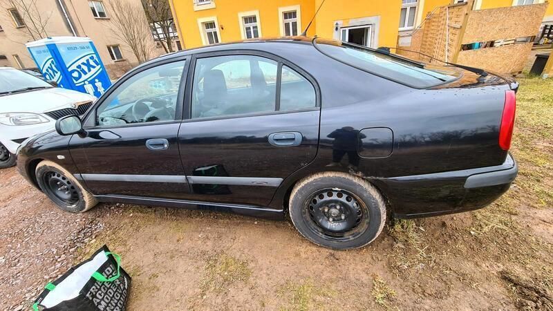 Schwarz Gebraucht 2003 Mitsubishi Carisma Limousine | 899 € (Fairer Preis) - Bild 1/4