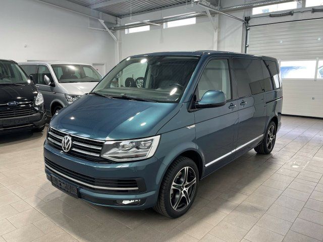 Bambusgarden green (metallic) Gebraucht 2017 VW T6 Highline Van | 49.790 € - Bild 1/4