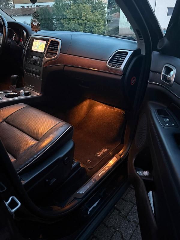 Gebraucht Jeep Grand Cherokee Overland 241 PS (177 kW) 2012 Schwarz SUV