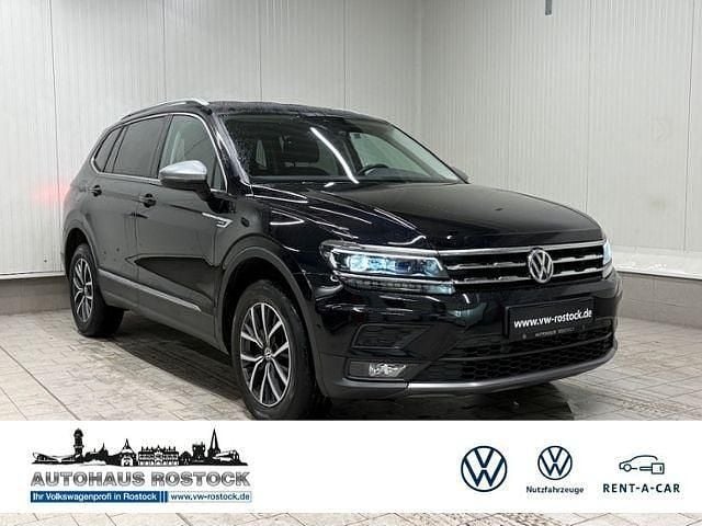 Deep black perleffekt (metallic) Gebraucht 2021 VW Tiguan Allspace Comfortline SUV | 27.831 € (Guter Preis) - Bild 1/4