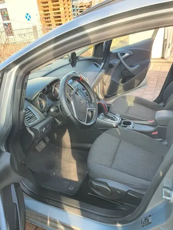 Używany Opel Astra Style 116 KM (85 kW) 2014 Srebrny Kombi