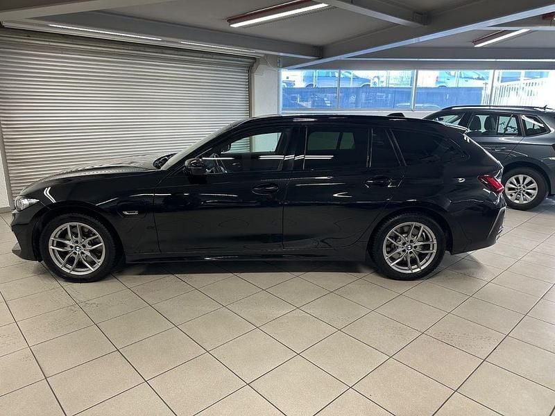 Gebraucht BMW 320e Performance 163 PS (119 kW) 2022 Schwarz Kombi